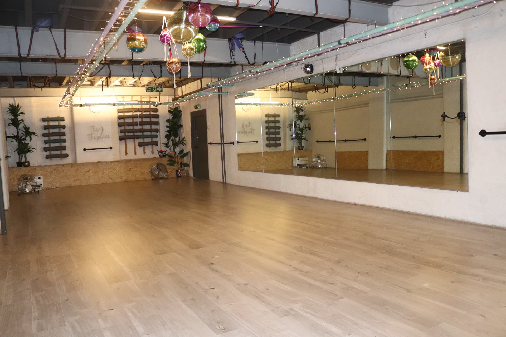 Wide view of Vibe Studio showing the sprung floor and mirrored wall